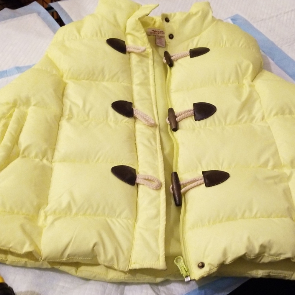 Yellowish puffer vest